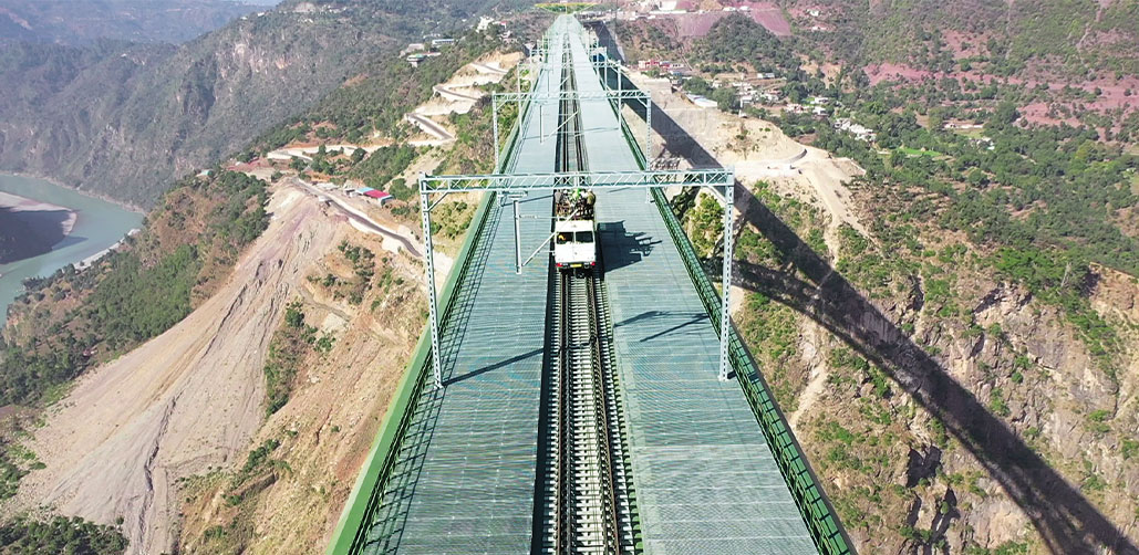 Electrification in Katra - Dharam section of USBRL including Chenab and Anji Khad bridges using Flexible and Rigid OCS